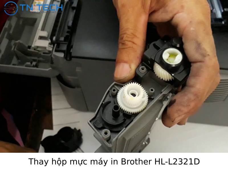 Thay hộp mực máy in Brother HL-L2321D